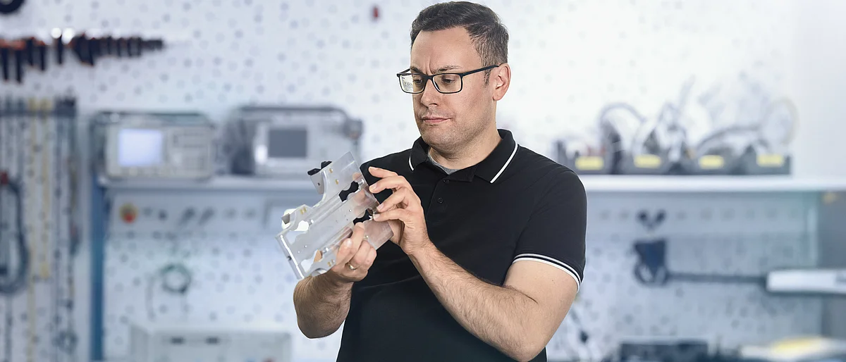 A Design Engineer examines a Part-21 modification.
